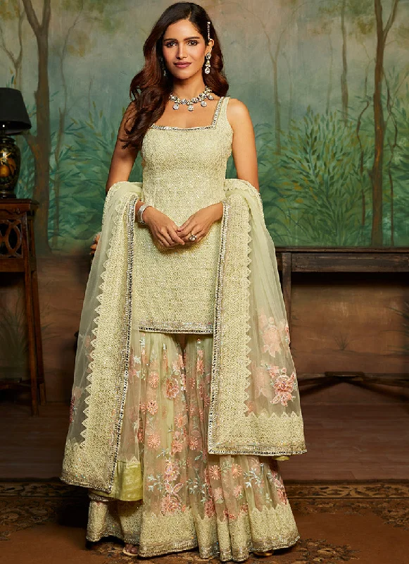 Cozy Footwear Soft Yellow Heavy Embroidered Gharara Suit